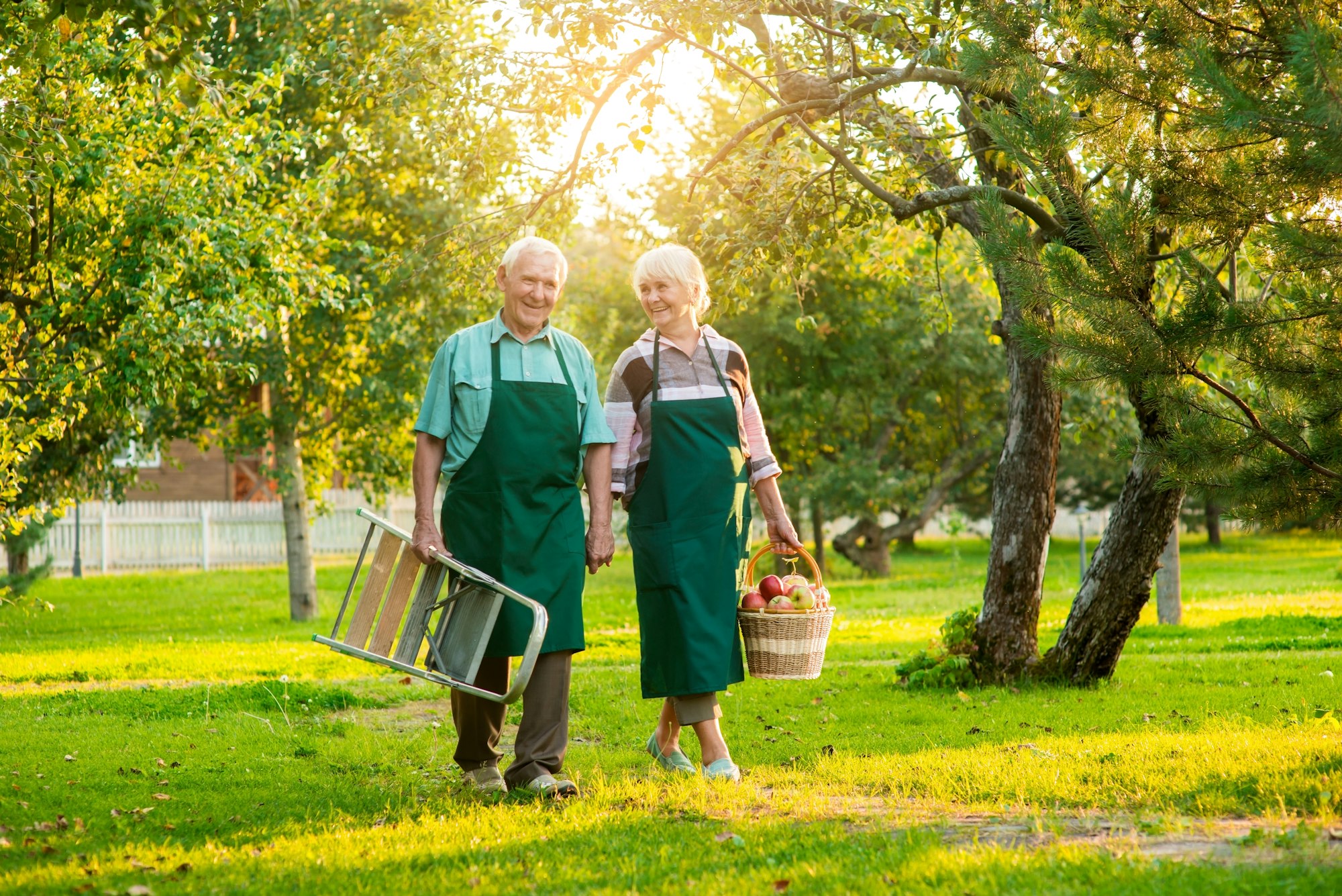 Happy senior gardeners